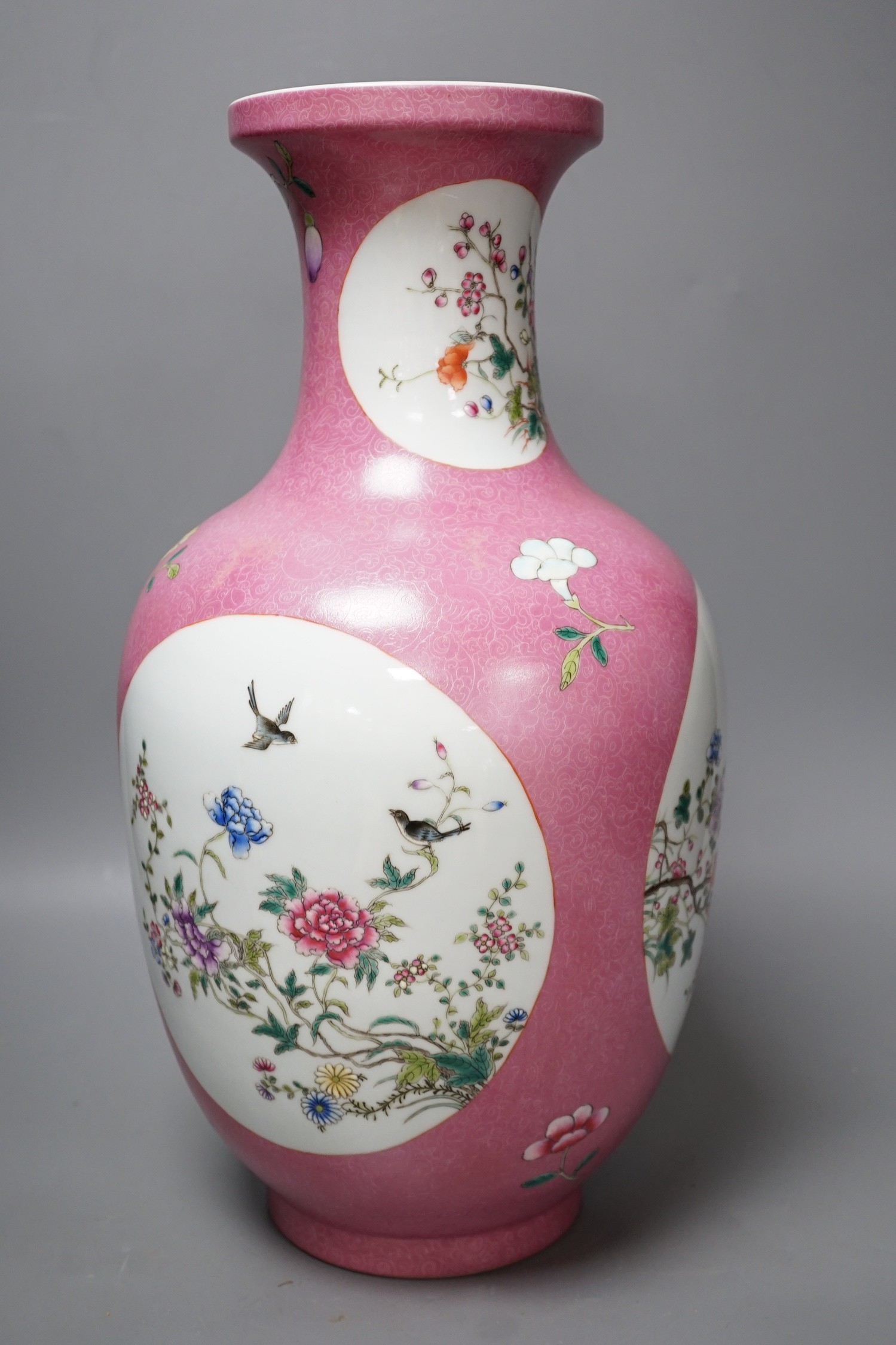 A large Chinese famille rose ruby ground vase, seal mark, 42cm